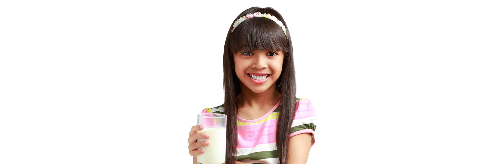 Photo of a girl holding a glass of milk. 