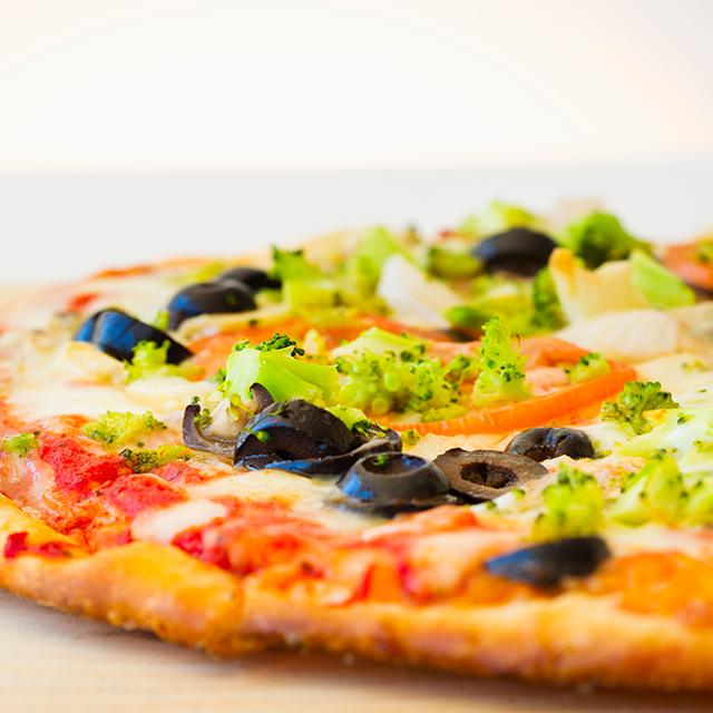 Photo of healthy vegetables on pizza.