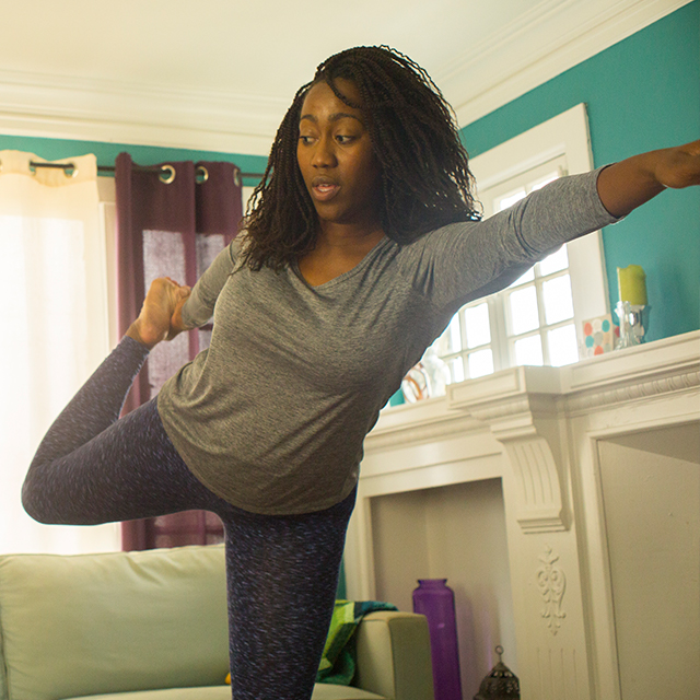 Image of woman doing yoga.