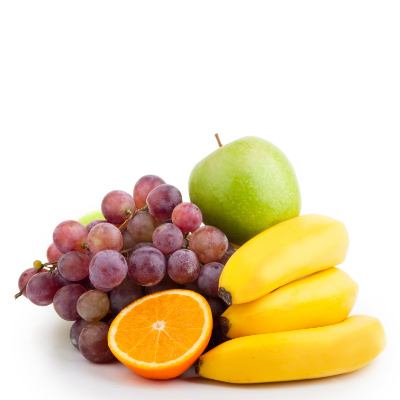 A variety of colorful fruits stacked on a plain white background.