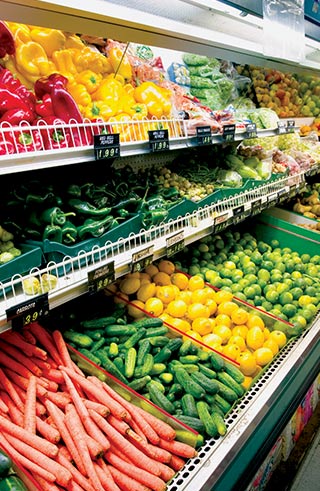 A picture of an assortment of vegetables in the market